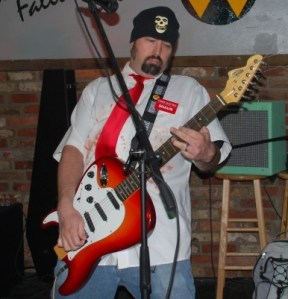 Eric Aixelsyd - Dewey Decibel FlipOut Guitar Lit Cigarette