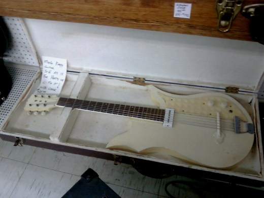 Merle R. Kegg - White Guitar