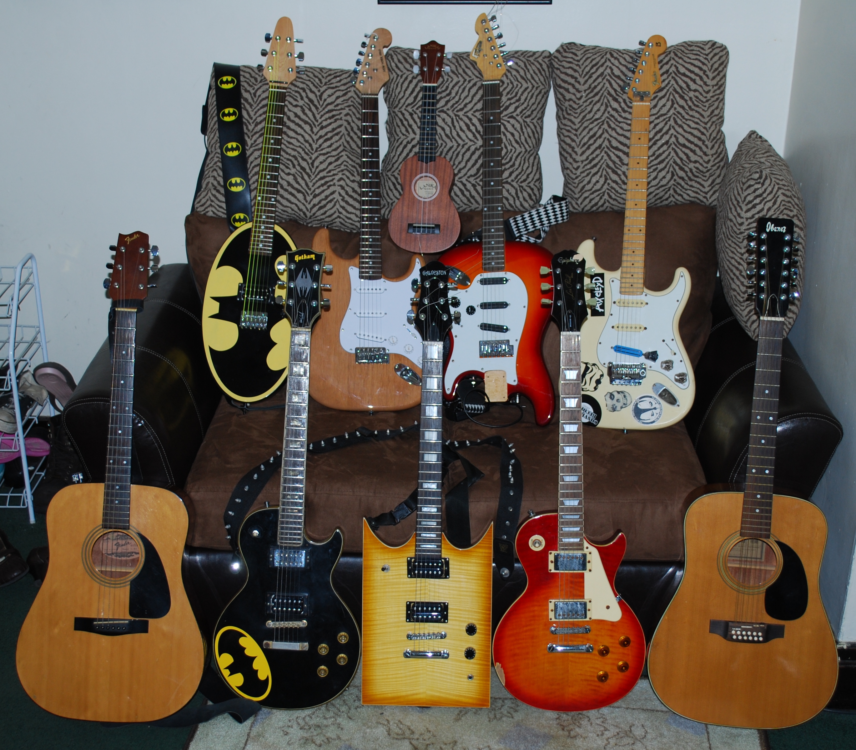 All of my guitars & the wife's ukulele All of my guitars & the wife's ukulele