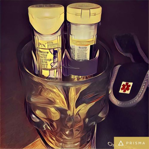 Epi-Pens in a Skull Glass