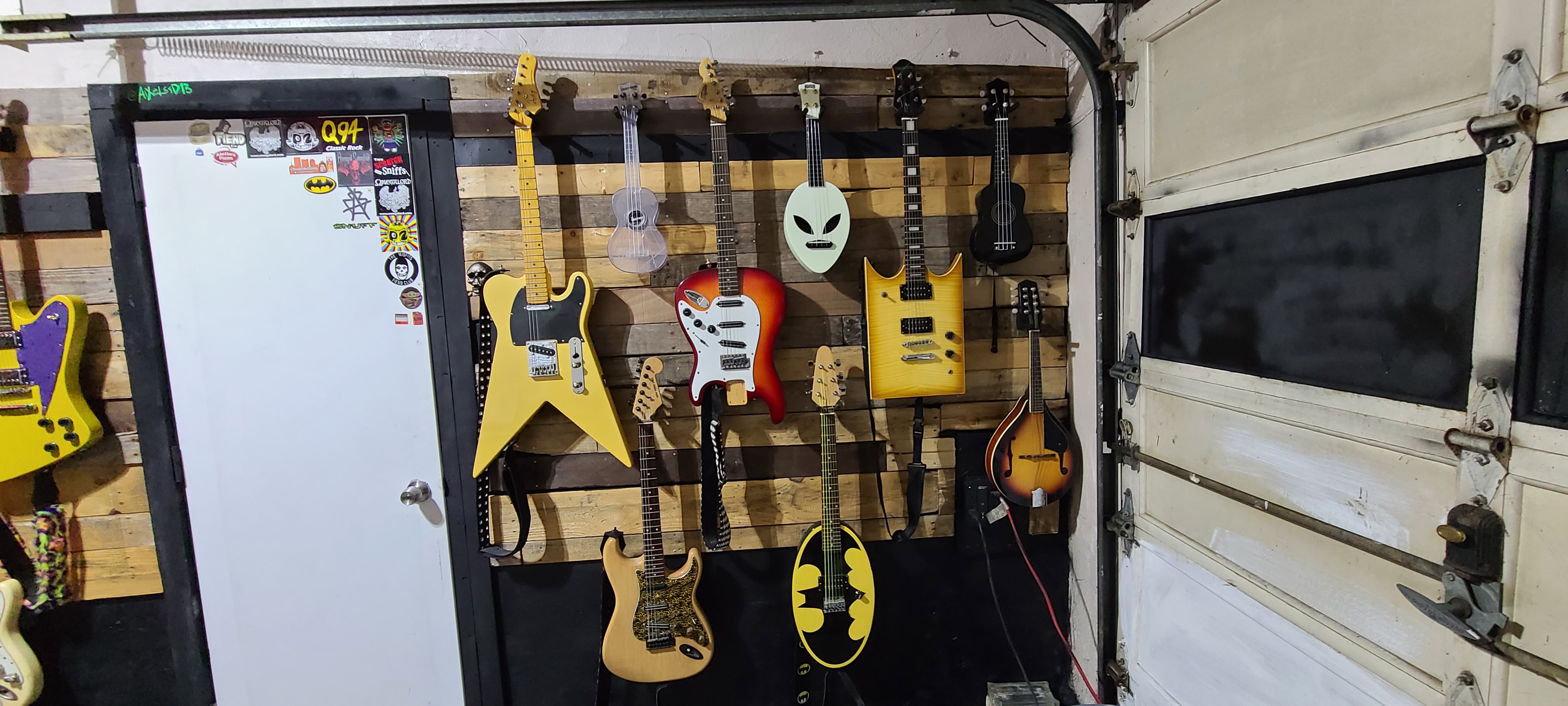 AiXeLsyD13's guitars - Right of the door.