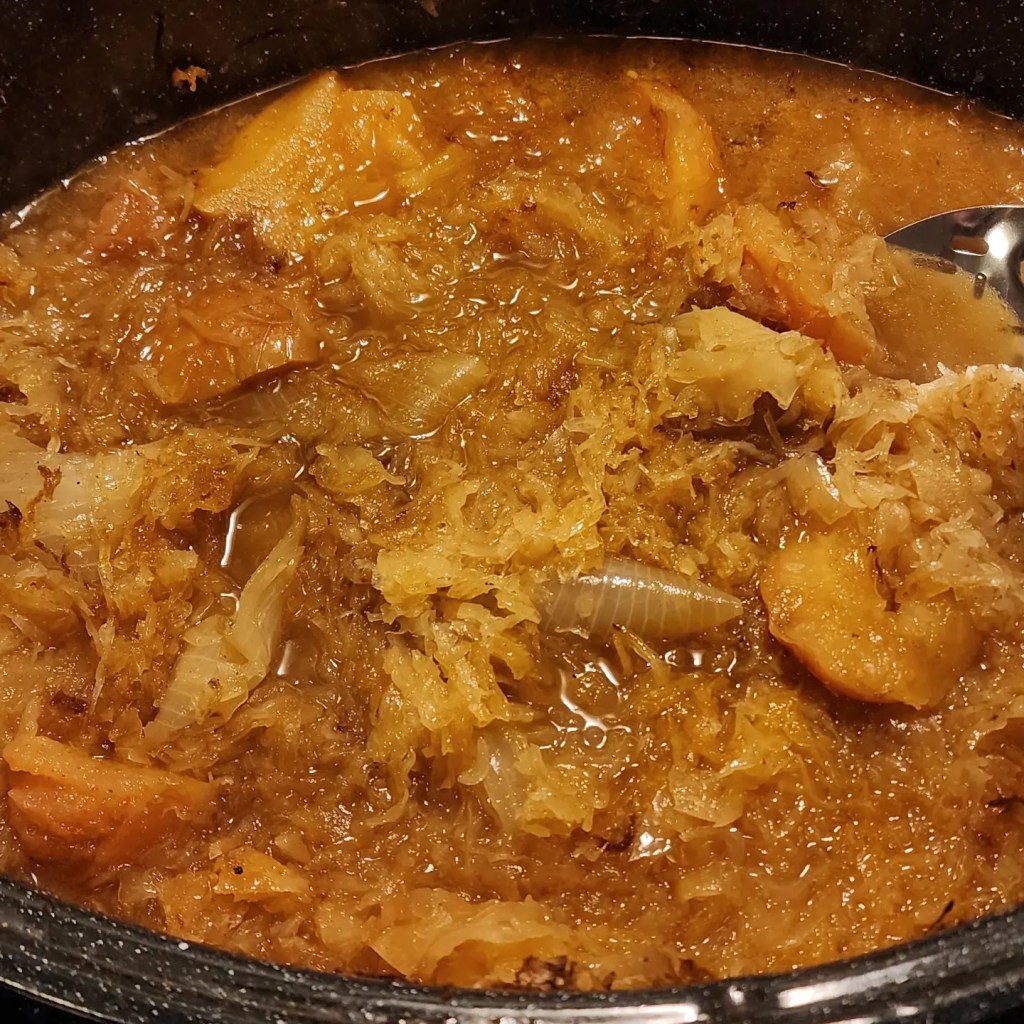 The Sauerkraut after cooking with apples & onions, & adding brown sugar.