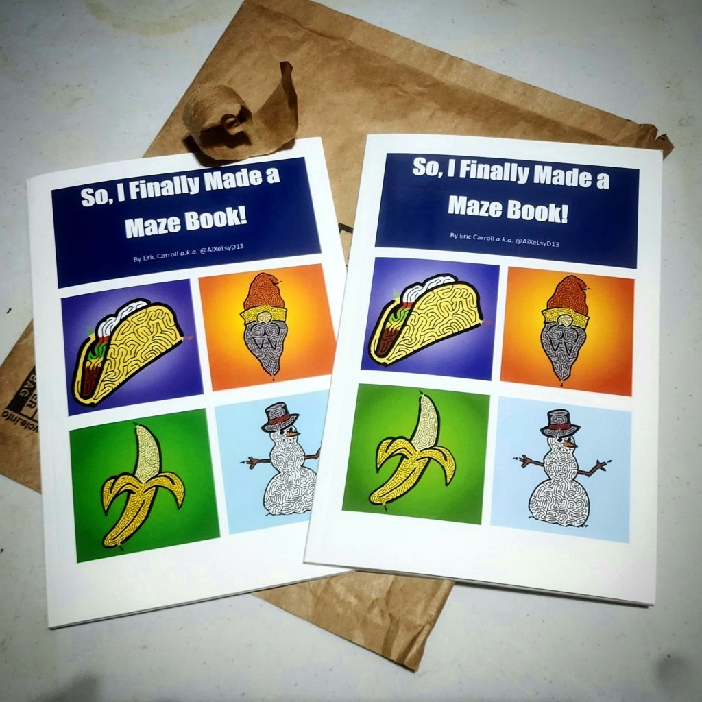 Two copies of my maze book, "So I Finally Made A Maze Book."