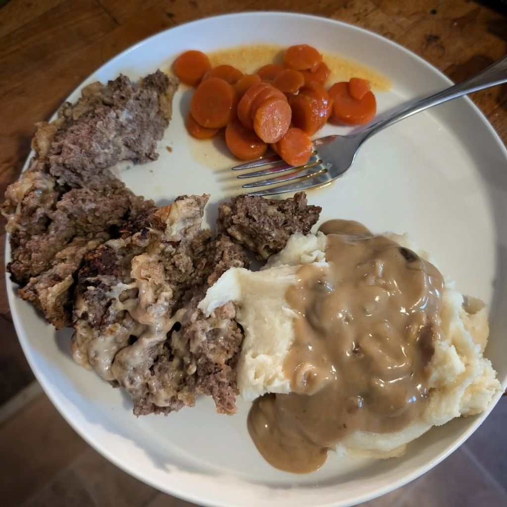 Mushroom, Onion, & Swiss/Gruyère Meatloaf, CHeesy Mashed Potatoes with mushroom & onion gravy & glazed carrots.